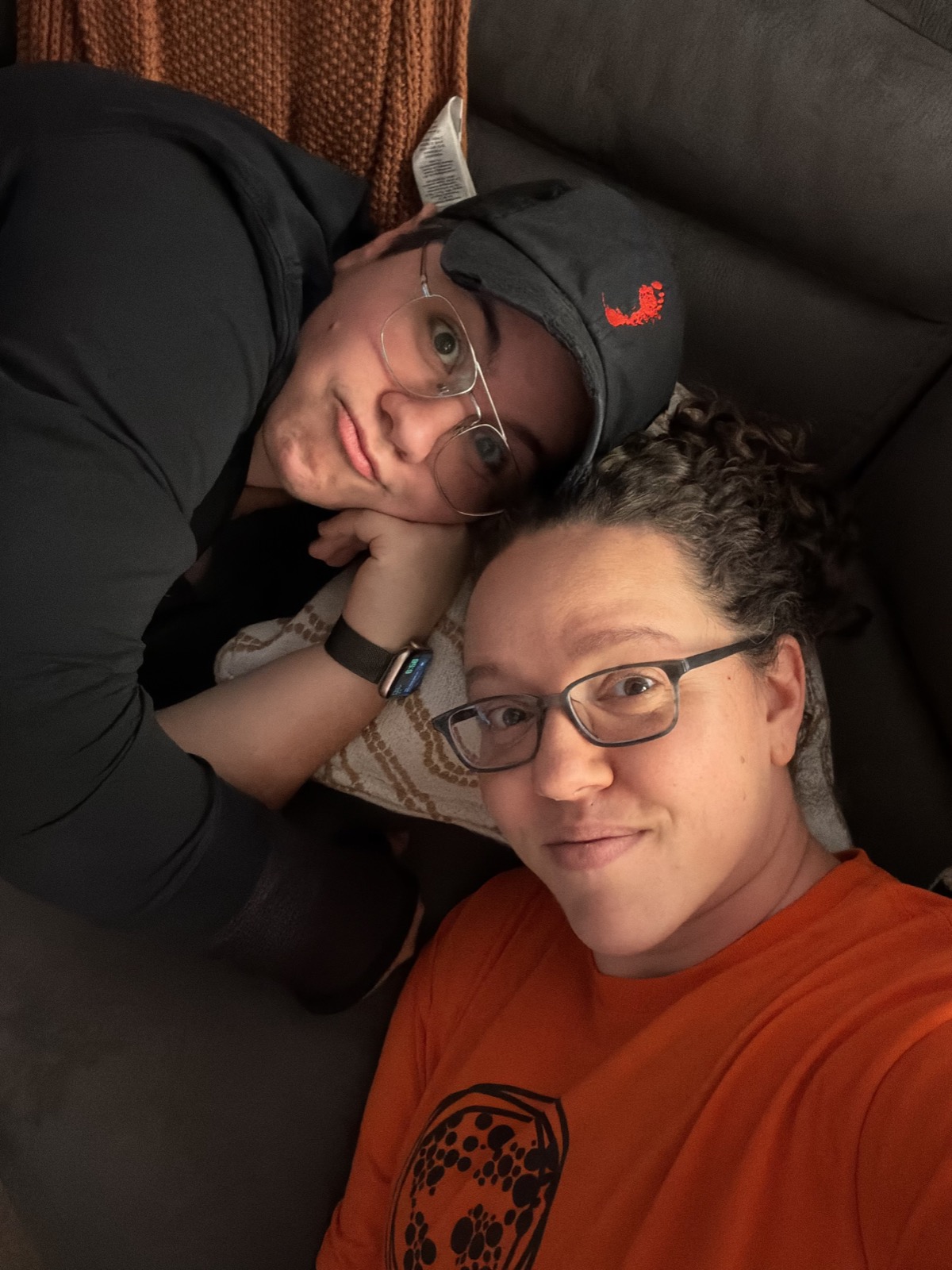 Megan and Sofia relaxing together on the couch